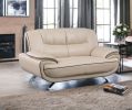 64" Beige And Silver Faux Leather Love Seat